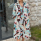 Colourful dress with 3/4-length sleeves and vintage floral print and pockets